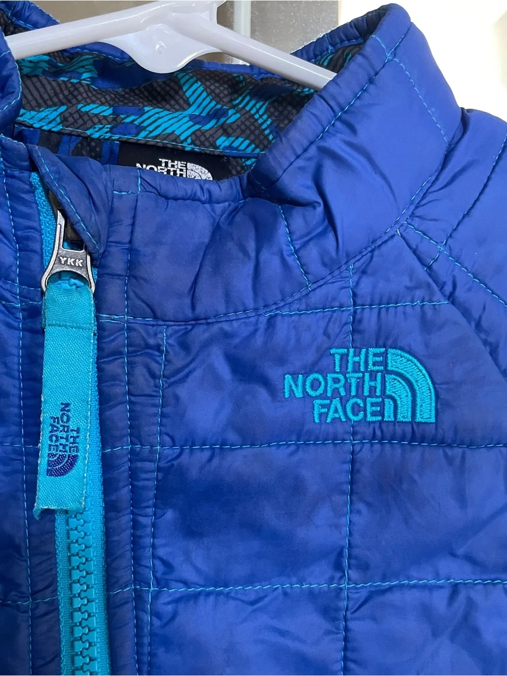 The North Face Toddlers' Royal Blue Quilted Puffer Jacket with Teal Trim